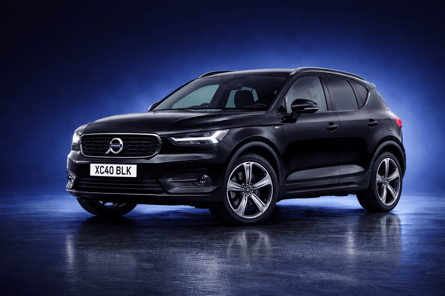 Black Volvo XC40 showcasing professional vehicle refinishing by Austen Cox