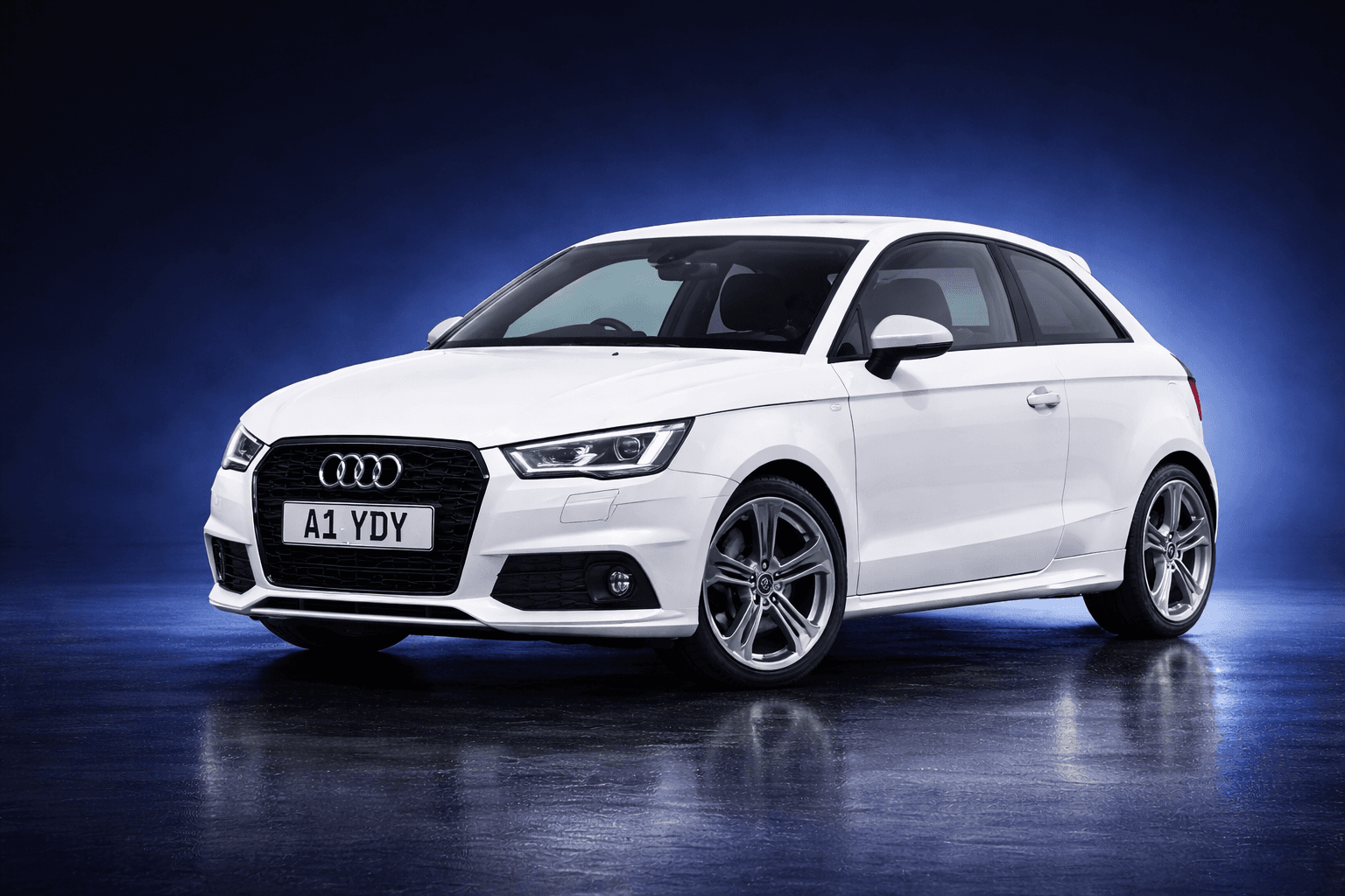 White Audi A1 showcasing professional vehicle refinishing by Austen Cox