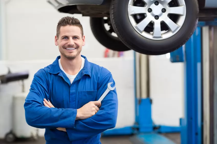 Austen Cox in his vehicle refinishing workshop